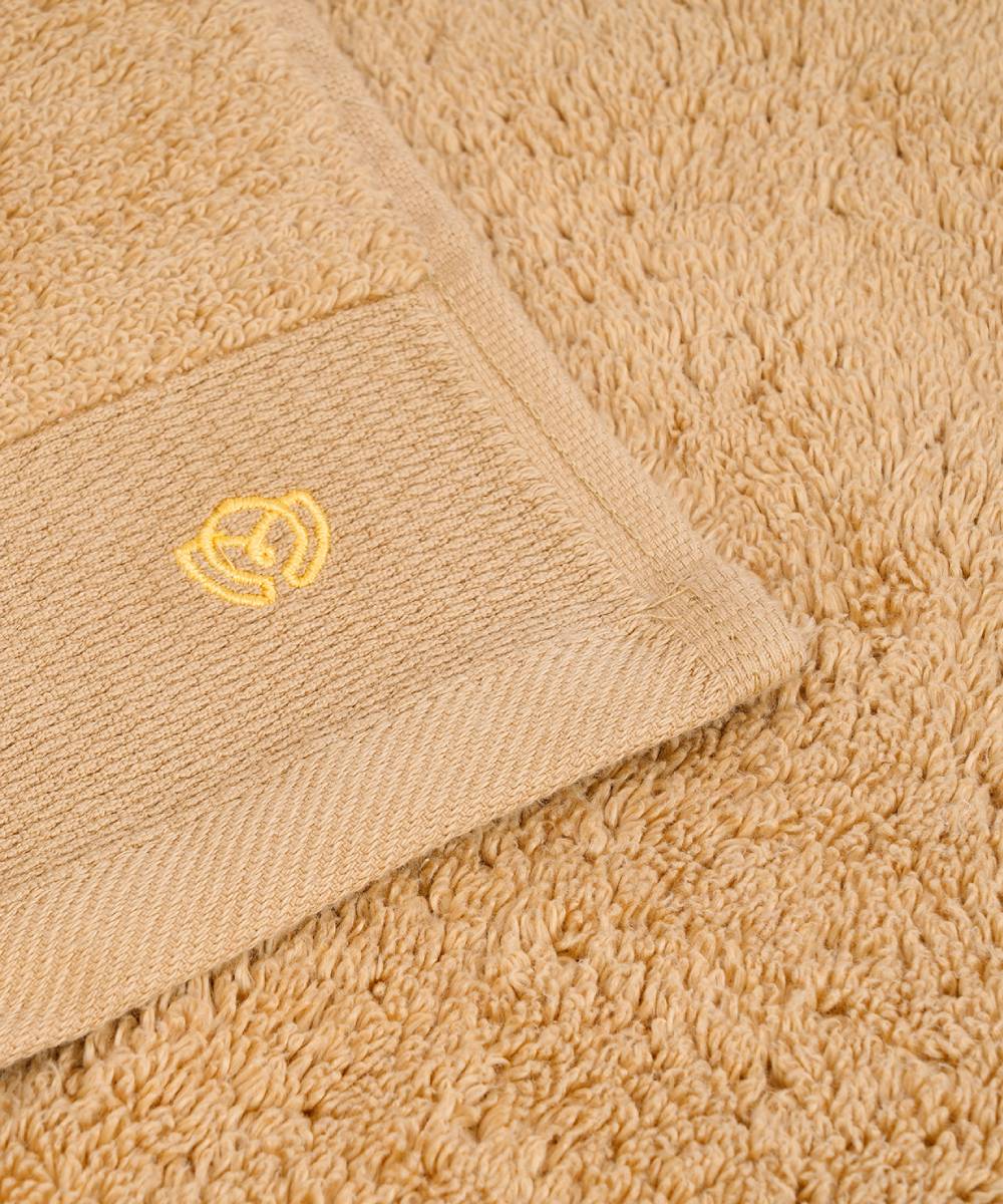 "Lightweight luxury hand towel offering both softness and absorbency."