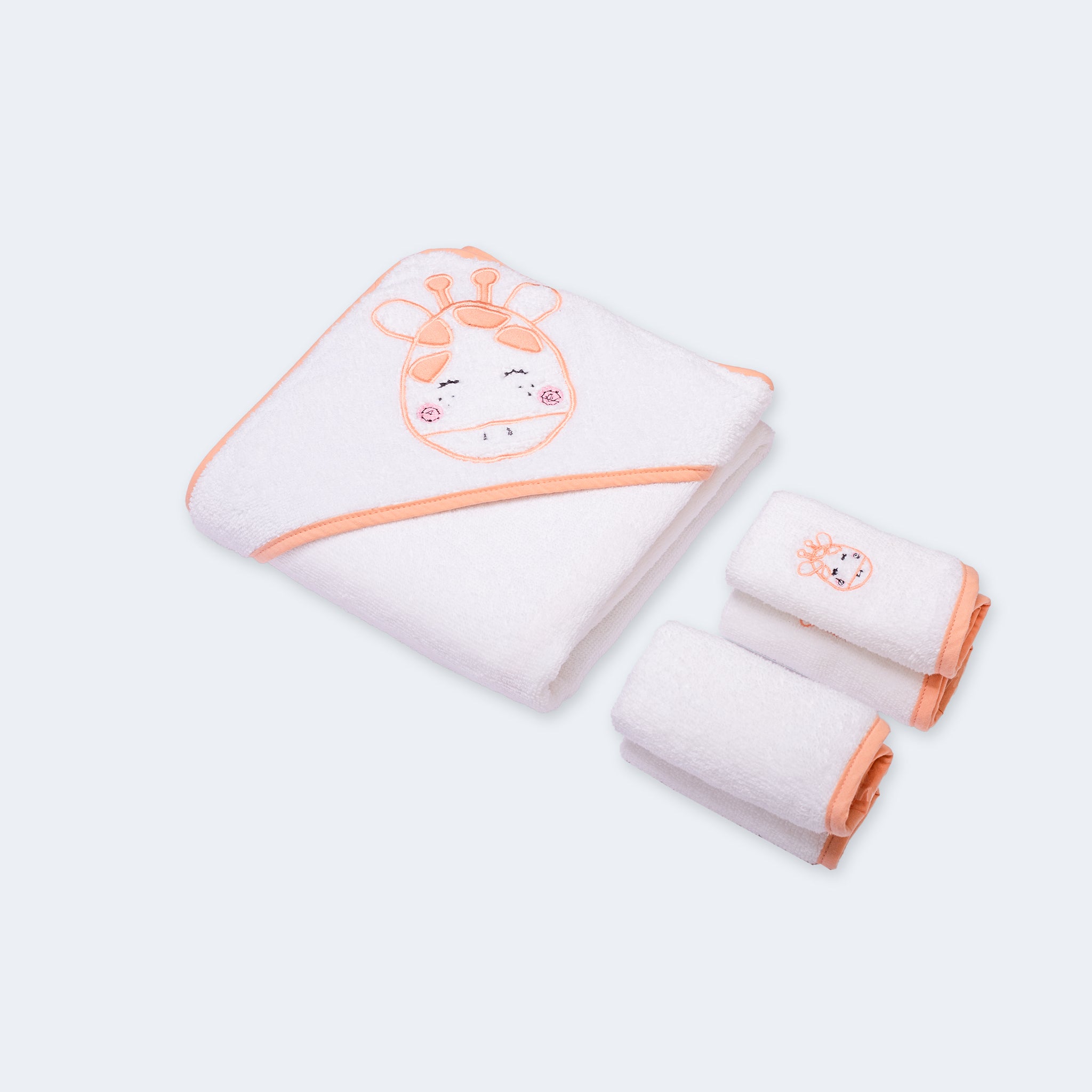 "Baby hooded towel set featuring a cute cow design, offering softness and warmth for your baby."