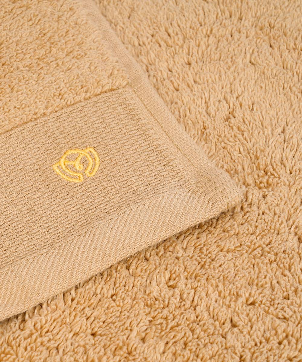 "Lightweight luxury hand towel offering both softness and absorbency."
