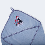 "Soft baby hooded towel featuring a cute boat design, designed to keep your little one dry and comfy."