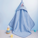 "Stylish baby hooded towel with a boat pattern, ideal for after-bath warmth and comfort."